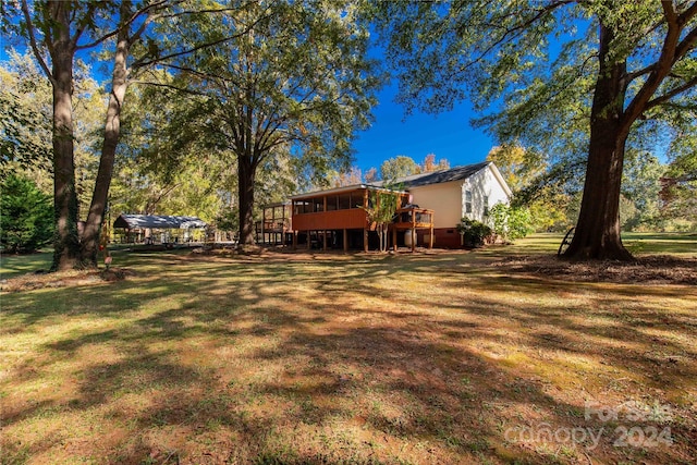 view of yard featuring a deck