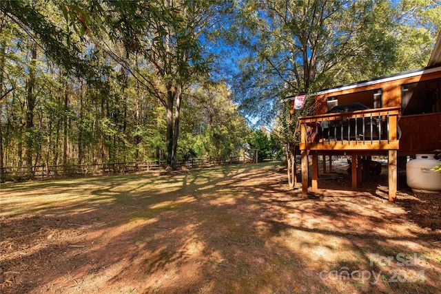 view of yard featuring a deck