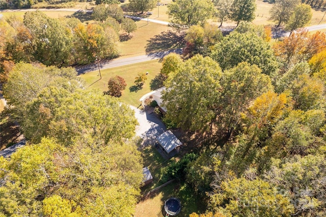 birds eye view of property with a rural view