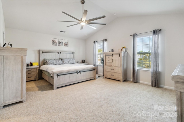 carpeted bedroom with lofted ceiling and ceiling fan