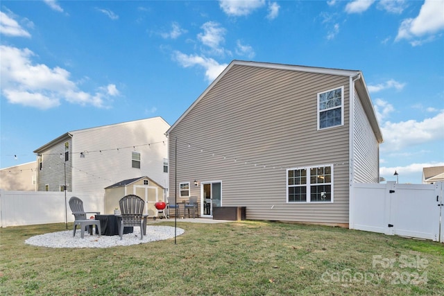 rear view of property with a patio area and a lawn