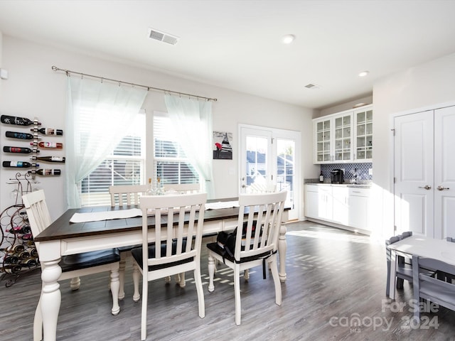 dining space featuring hardwood / wood-style floors