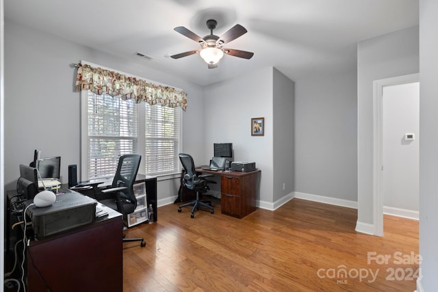 office space featuring hardwood / wood-style flooring and ceiling fan