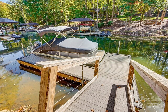 view of dock with a water view