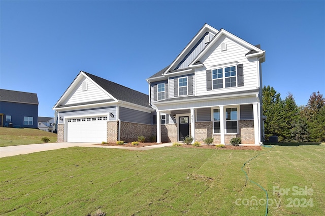 craftsman-style house with a garage, a front lawn, and a porch