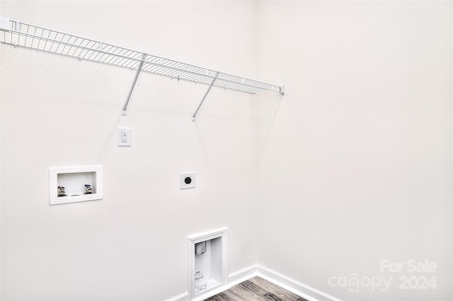 laundry area with electric dryer hookup, washer hookup, and hardwood / wood-style flooring