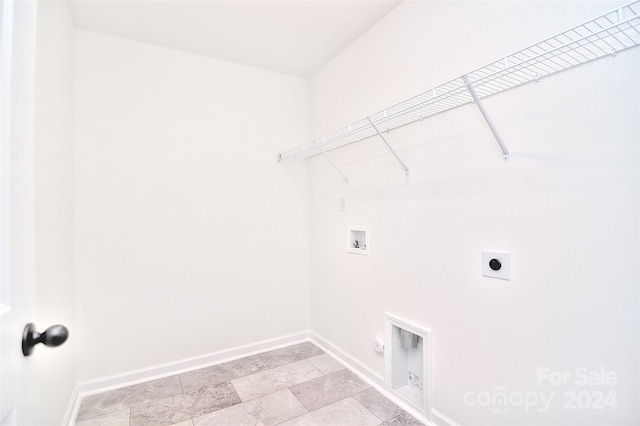 laundry area featuring hookup for a gas dryer, hookup for a washing machine, and electric dryer hookup