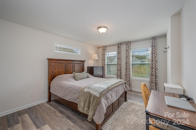 bedroom featuring hardwood / wood-style floors