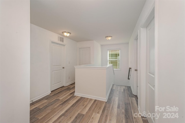 hall featuring hardwood / wood-style flooring