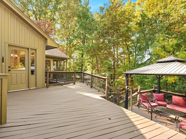 wooden deck featuring a gazebo