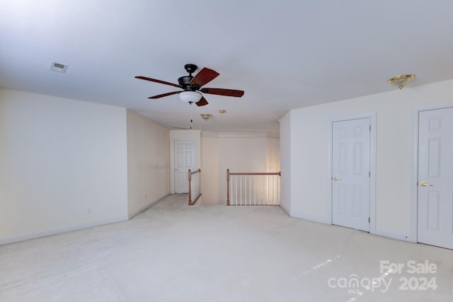 interior space featuring ceiling fan