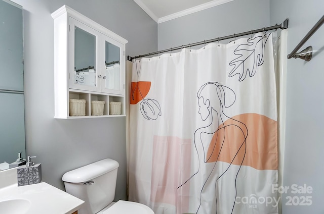 bathroom featuring a shower with shower curtain, vanity, toilet, and ornamental molding