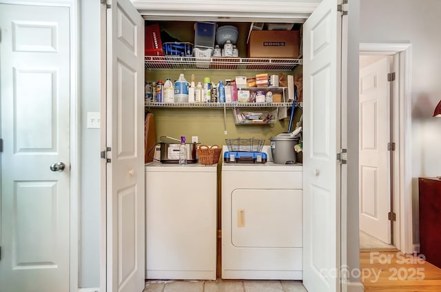 laundry area featuring tile patterned flooring and independent washer and dryer