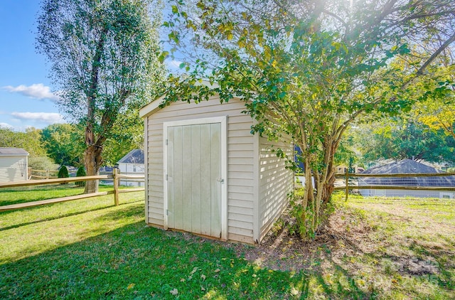 view of outdoor structure featuring a yard