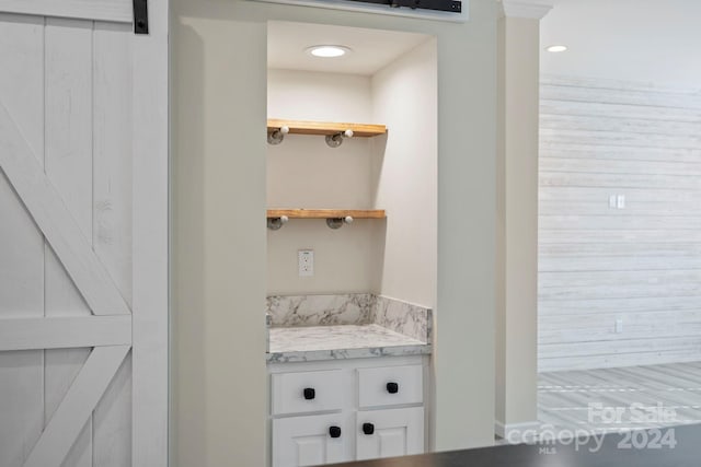 interior space featuring white cabinets