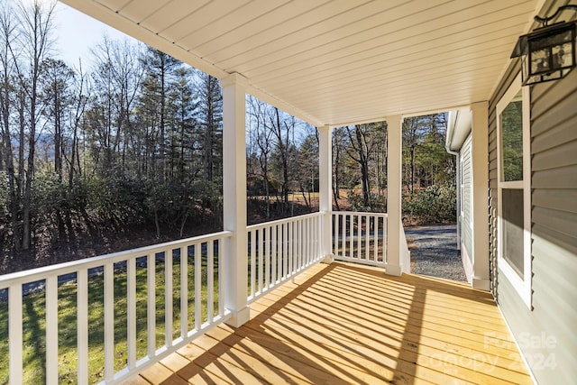 wooden terrace with covered porch