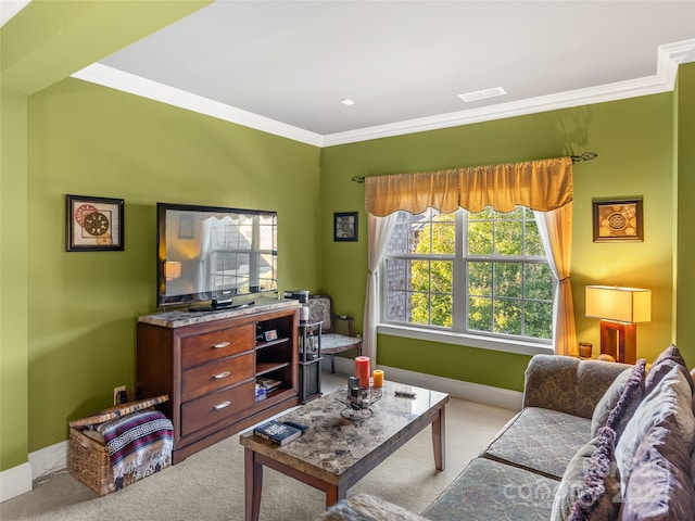 carpeted living room featuring crown molding and a wealth of natural light