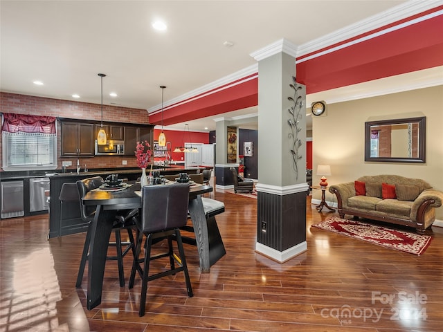 interior space featuring dark hardwood / wood-style flooring and ornamental molding