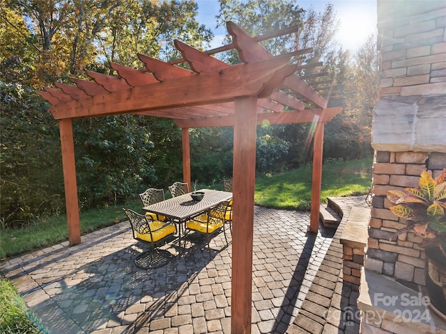 view of patio / terrace featuring a pergola