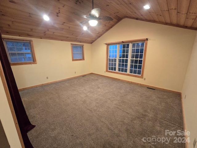 unfurnished room with carpet floors, ceiling fan, vaulted ceiling, and wooden ceiling