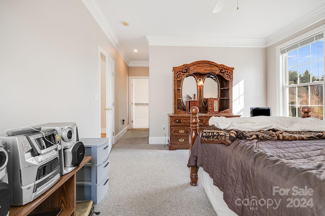 bedroom featuring light carpet, ornamental molding, and ceiling fan