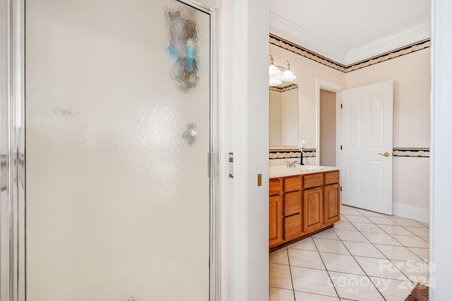 bathroom with vanity, crown molding, tile patterned floors, and a shower with door