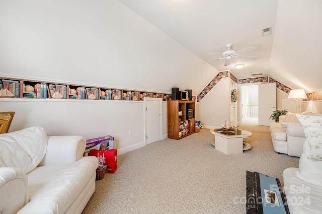 carpeted living room featuring lofted ceiling and ceiling fan