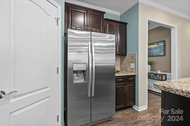 kitchen featuring backsplash, dark brown cabinets, stainless steel fridge with ice dispenser, and dark hardwood / wood-style flooring