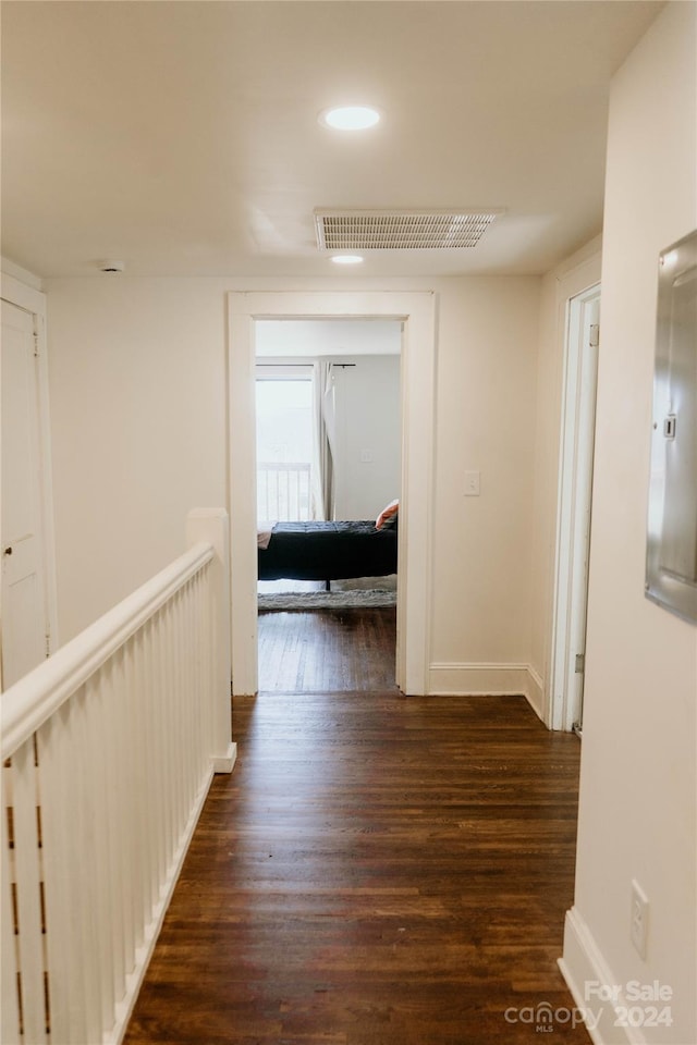 hall featuring dark hardwood / wood-style floors