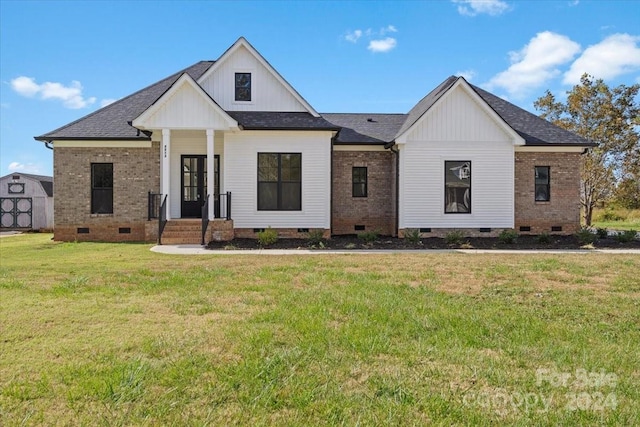 modern farmhouse featuring a front lawn