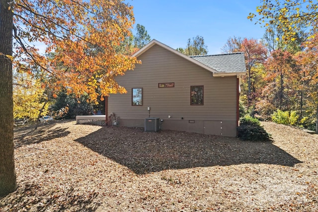 view of property exterior featuring central AC