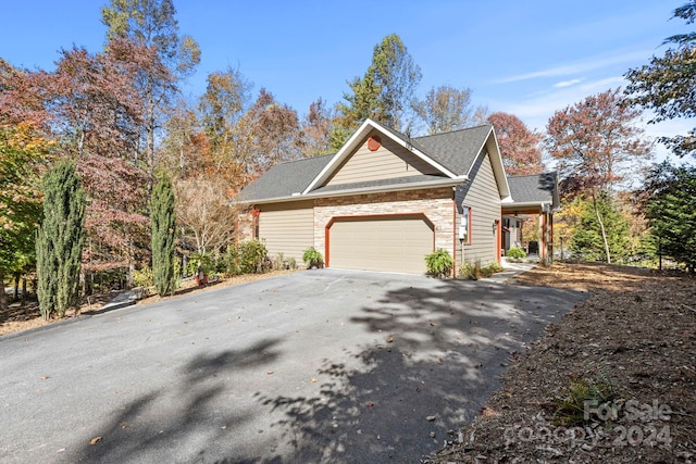 view of property exterior featuring a garage