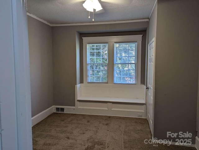 602 W Council St, Salisbury, NC 28144 - carpeted empty room featuring a textured ceiling, crown molding, and ceiling fan