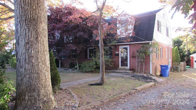 view of front of house with central air condition unit