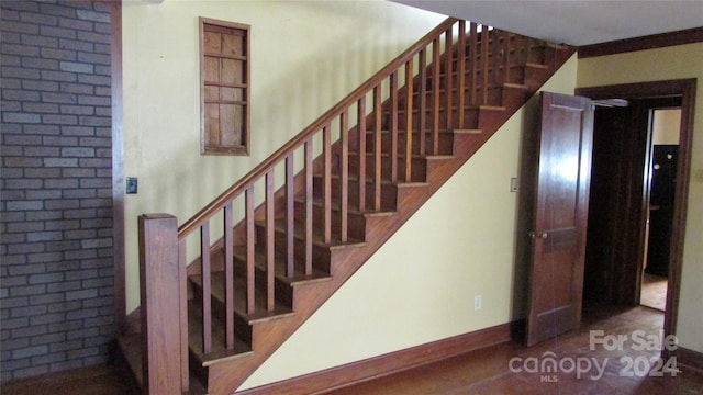 stairway with crown molding