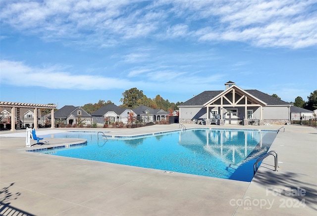 view of pool featuring a patio area