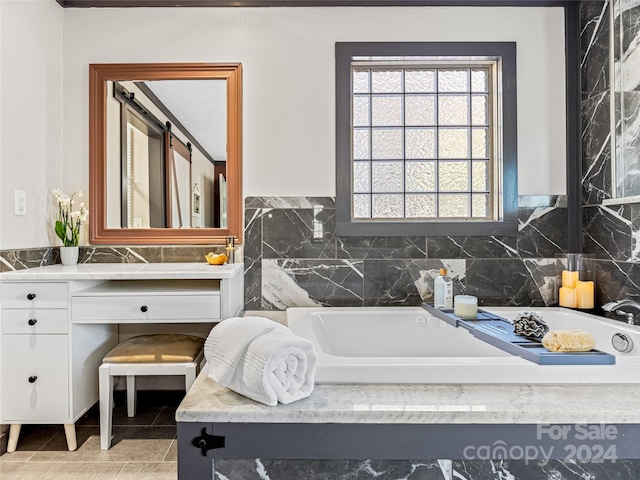 bathroom featuring vanity and a bathing tub