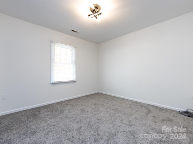 view of carpeted spare room