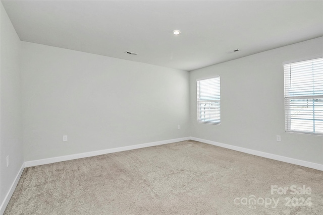 view of carpeted spare room