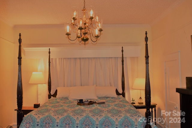 115 S Pearl St, Troy, NC 27371 - bedroom featuring a notable chandelier and ornamental molding