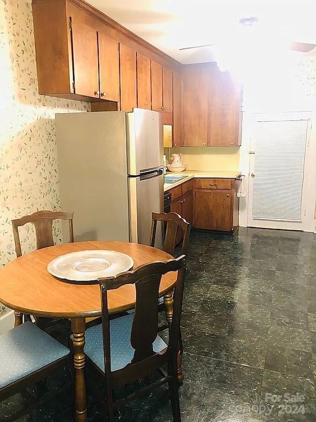 115 S Pearl St, Troy, NC 27371 - kitchen with white fridge and sink