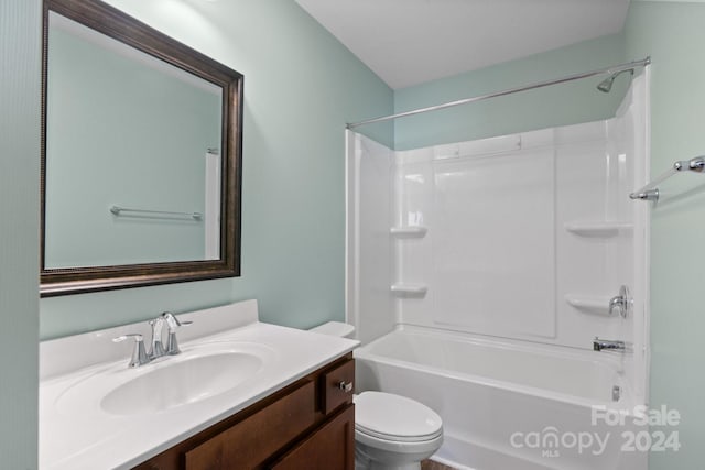 full bathroom featuring vanity, washtub / shower combination, and toilet