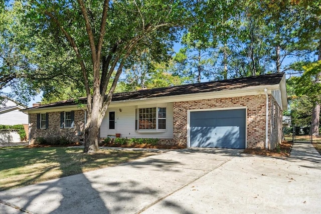 single story home with a front lawn and a garage