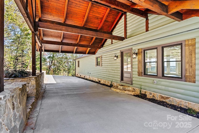 6230 Pine Ridge Dr, Connelly Springs, NC 28612 - view of patio featuring an attached carport