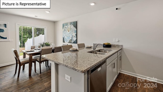 kitchen featuring sink, stainless steel dishwasher, white cabinets, light stone counters, and dark hardwood / wood-style flooring