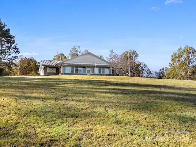 exterior space with a front lawn