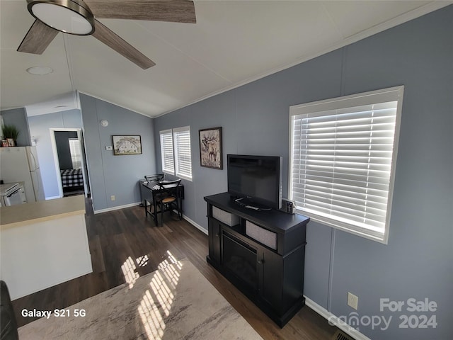 living room with crown molding, vaulted ceiling, dark hardwood / wood-style floors, and ceiling fan