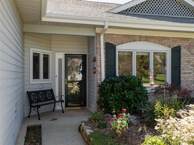 doorway to property with a porch