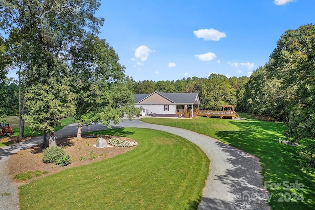 view of front of home with a front yard