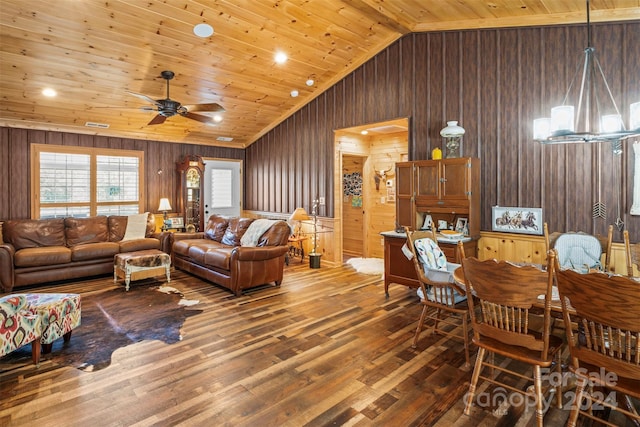 living room with wooden walls, wood-type flooring, lofted ceiling, and wooden ceiling